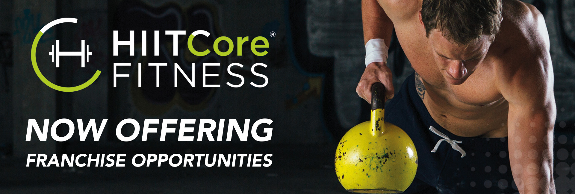 Now Offering Franchise Opportunities HIITCore Image Header. Man holding a kettlebell.